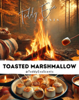 Toasted marshmallows over a campfire with Teddy Eva Scents branding.