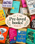 Pre-loved books spread on a wooden table, from £2