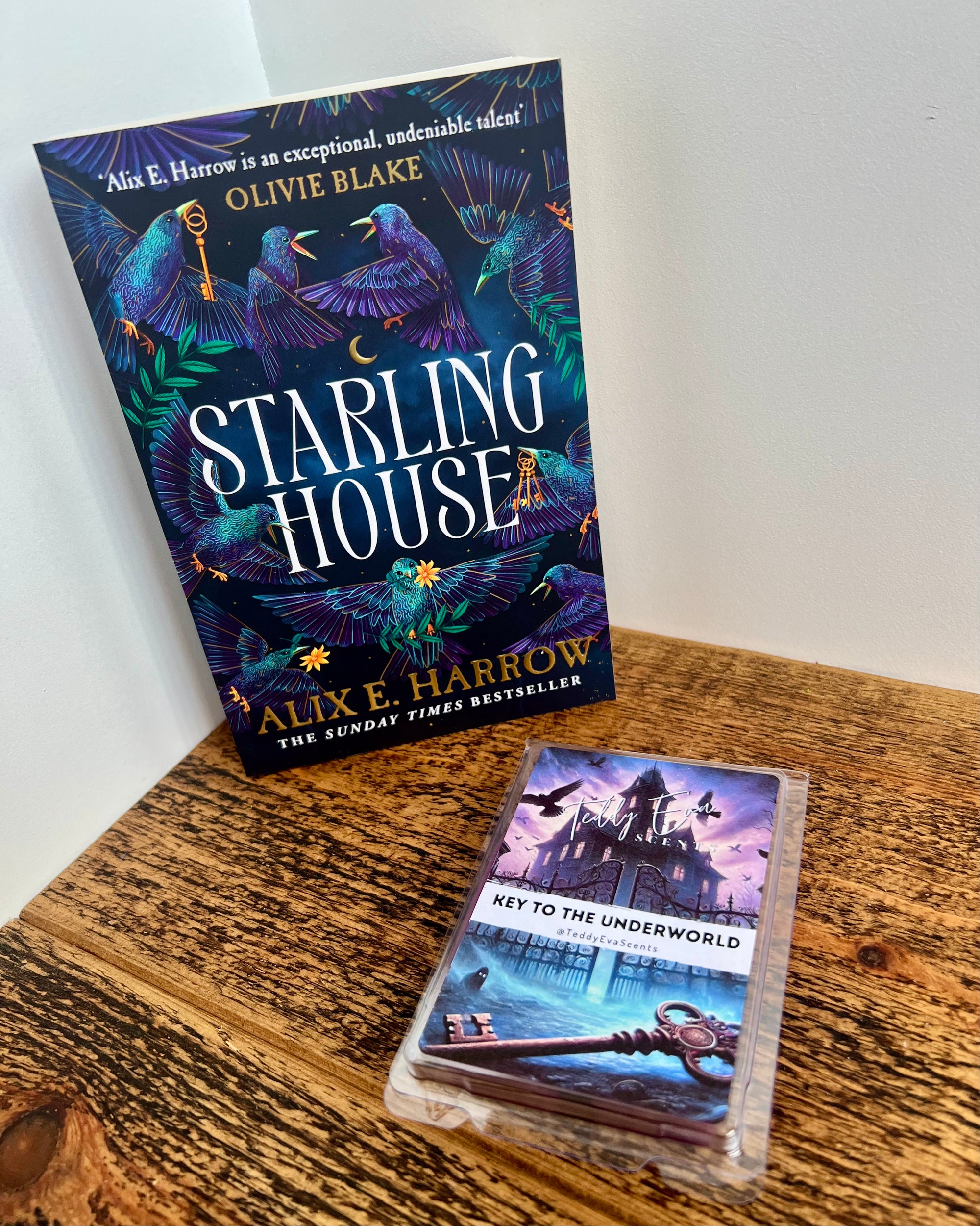 Starling House | Book By Alix E. Harrow with a wax melt