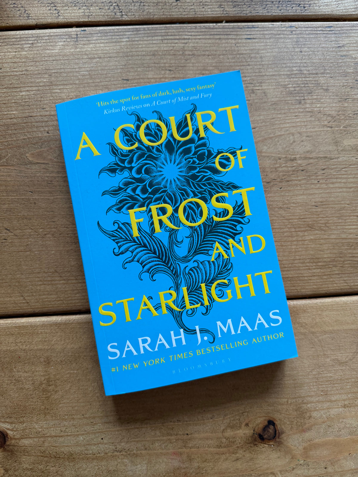 Actual pre-loved copy of A Court of Frost and Starlight