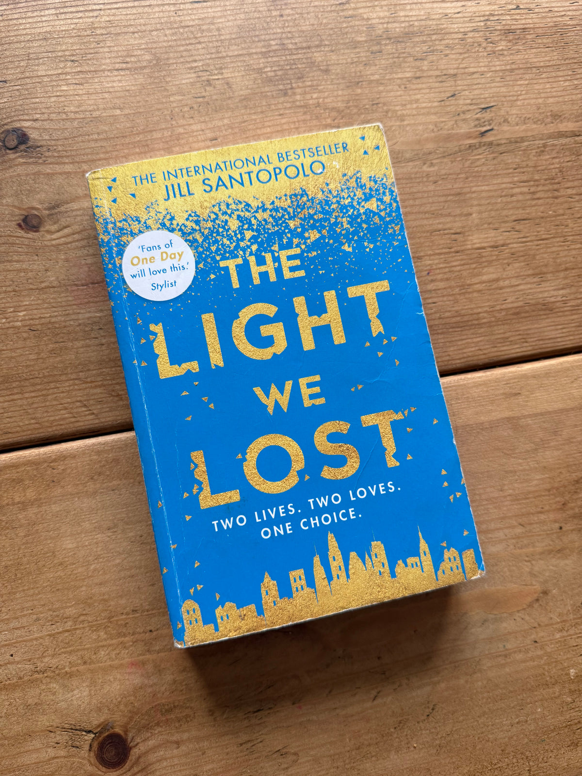 Actual pre-loved copy of The Light We Lost — Jill Santopolo